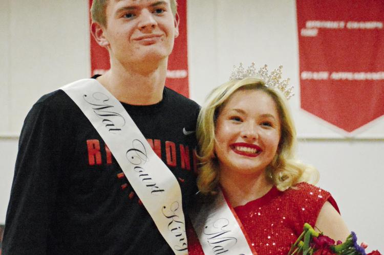 HUNTER MITCHELL and Livia Cavanah sport their crowns and sashes after being after being named mat court king and queen, between Richmond High School varsity basketball games. SHAWN RONEY | Staff