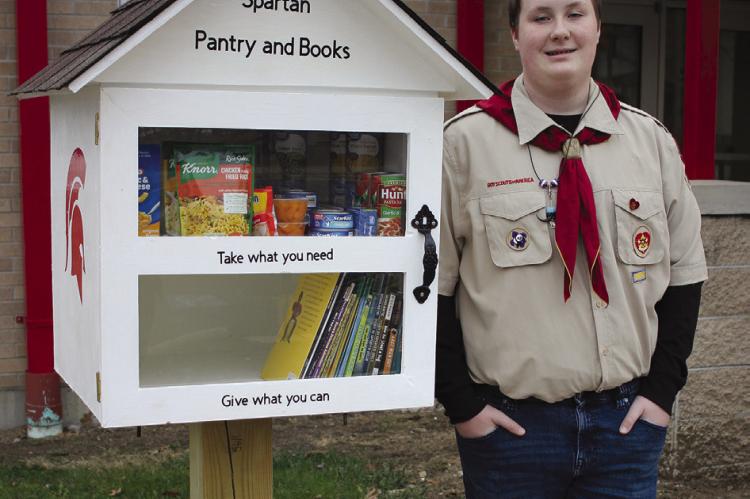 KALVIN SPRATT, 15, created the “Spartan Pantry and Books” as his Eagle Scout project. SOPHIA BALES | Staff