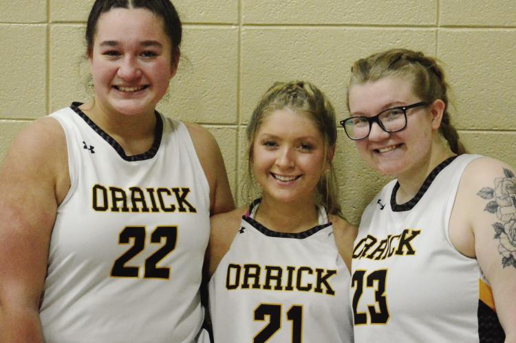 ORRICK ALSO honors its three girls basketball seniors between Tuesday’s varsity games with Concordia. After the ceremony, they take time for a group photo. From left are Madalyn Norton, Kirra Vaughn and Kaitlin Leader. SHAWN RONEY | Staff