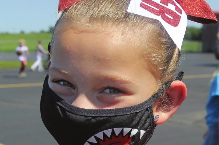 ON THE PLAYGROUND at Sunrise Elementary School, third-grader Ariel Lee wears a safety mask. J.C. VENTIMIGLIA | Staff