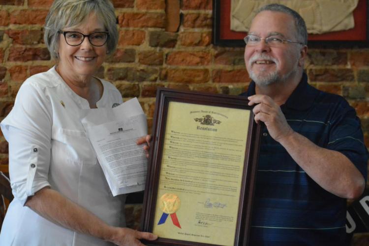 STATE REP. Peggy McGuagh presents Jack “Miles” Ventimiglia with a resolution from the Missouri House of Representatives commending Ventimiglia for his decades of service as a journalist, including with the Richmond News and Excelsior Springs Standard. A retirement party is held for Ventimiglia June 16 at Hometown Pizza in Richmond. SHAWN RONEY | Staff