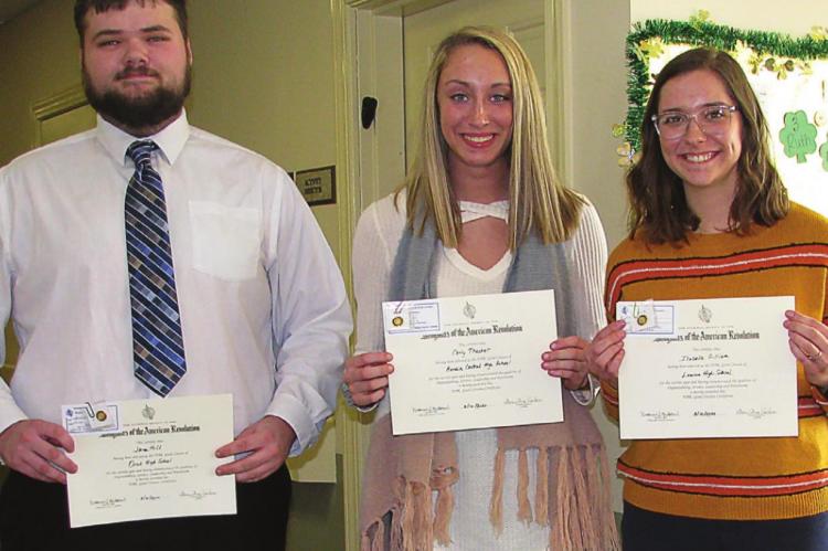 AT THE CEREMONY, from left, are Jaron Hill of Orrick, Carly Thacker of Hardin-Central and Isabelle Gilliam of Lawson.