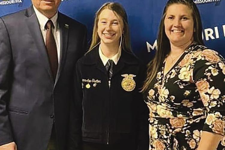 FFA ADVISOR Charlie Forman (from left), Richmond High School 2022 graduate GraceAnn Skelton and FFA Advisor Laura Allen celebrate Skelton’s success of earning the American FFA Degree. She was named the 2023 State Winner for the “Ag Processing Proficiency Award” and earned a bronze rating at the national level during the Missouri State Fair. Submitted