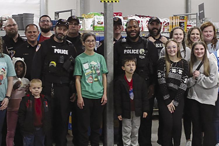 LOCAL YOUTH join the Richmond Police Department for holiday shopping. Submitted