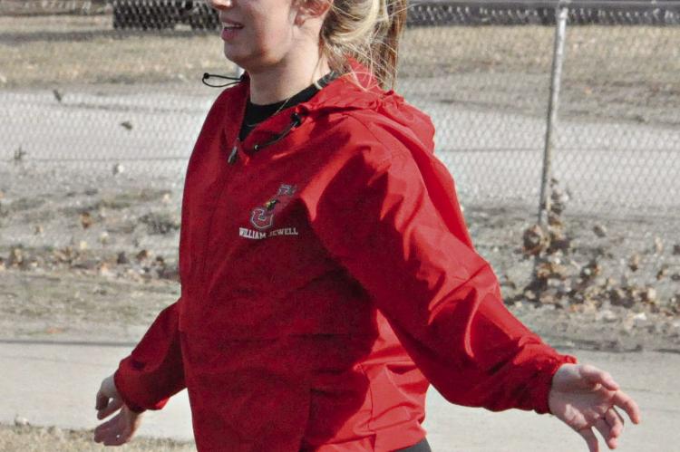 CARLY THACKER, shown training in March 2020 at Hardin-Central while sporting a William Jewell College windbreaker, holds the No. 2 spot on William Jewell’s all-time list in the women’s 600-yard run. SHAWN RONEY | Staff