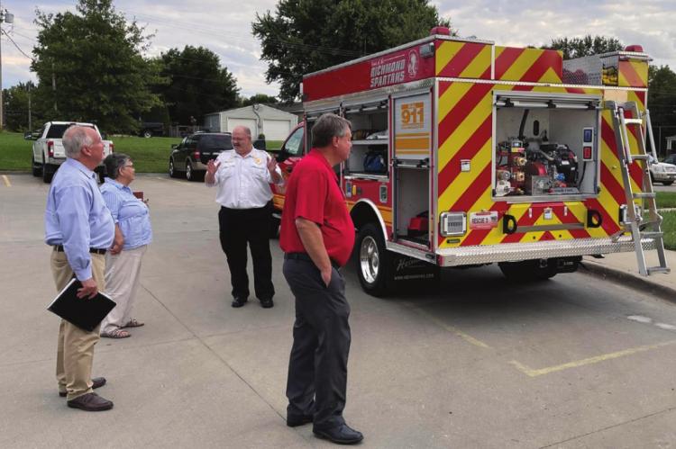 THE NEW TRUCK is viewed, from left, by City Attorney Chris Williams, Councilwoman Deanna Guy, Fire Chief Mark Sowder and Mayor Mike Wright. BRIAN RICE | Staff