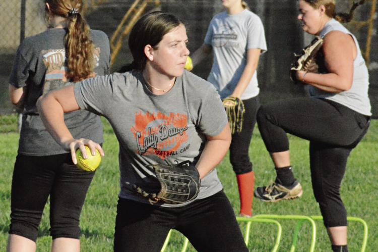 LIBBY FIFER sets to throw during infield drills Aug. 11 at Norborne. SHAWN RONEY | Staff
