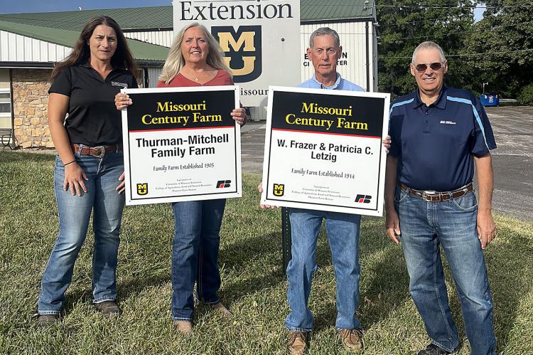 THE THURMAN-MITCHELL FAMILY FARM, managed by Sandra Williams, second from left, and W. Frazer (second from right) and Patricia C. Letzig, received the Missouri Century Farm Award this year. Katie Nerner of the University of Missouri Extension, left, and Jim Proffitt of the Missouri Farm Bureau presented the awards honoring families who have been farming in rural communities for at least 100 years. SOPHIA BALES | Staff