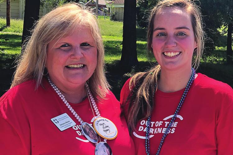 BARB MARES and Samara Gant lead the fight in Ray County to prevent suicide by walking at last year’s event. Gant chairs the county’s walk from 10 a.m. to 1 p.m. Sept. 12 at Hardin-Central.