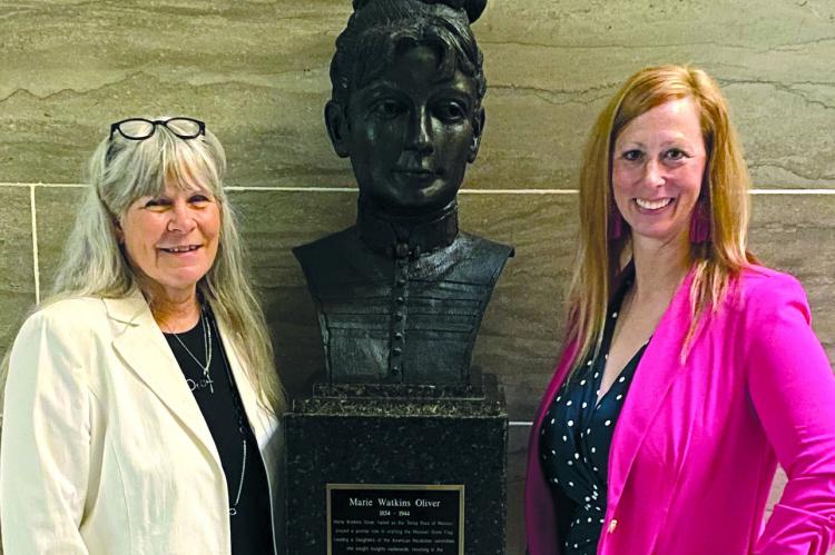 RAY COUNTY MUSEUM administrator Cathy Gottsch (left) and Ray County Prosecutor and Historical Society Board Member Camille Johnston stand with the newly-inducted bust of Marie Watkins Oliver into the Missouri Hall of Famous Missourians at the state capital. CAPITOL PHOTOGRAPHER | Submitted