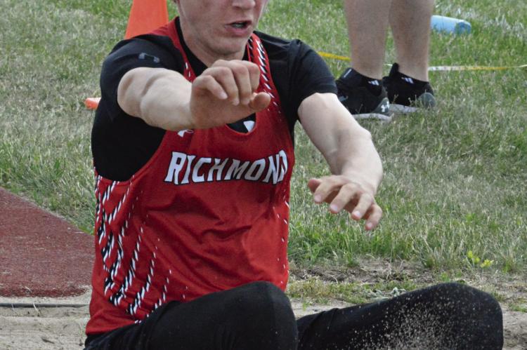 JACOB JOHNSON lands after a boys long jump attempt at Class 3 District 8 competition May 13 at Chillicothe High School. Johnson, a sophomore, finishes third and qualifies for the Sectional 4 meet Saturday at Warrensburg. SHAWN RONEY | Staff