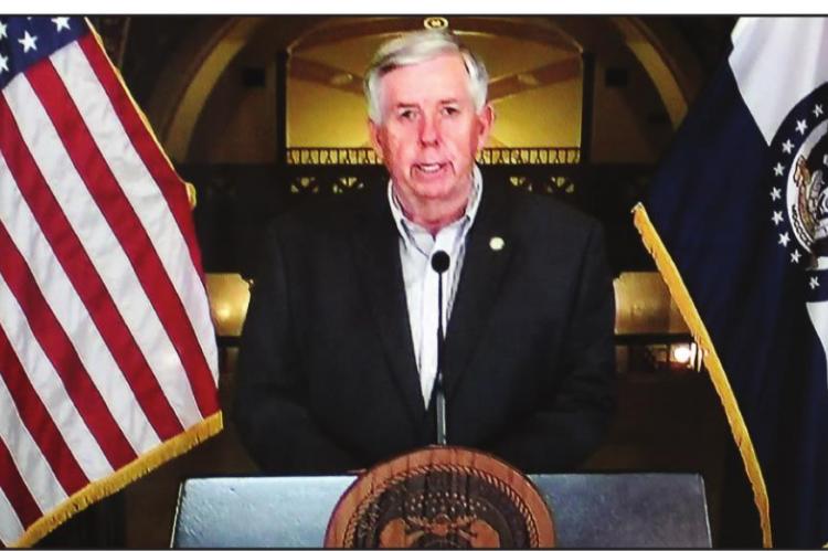 GOV. MIKE PARSON gives a coronavirus update at the Capitol in Jefferson City on March 27.