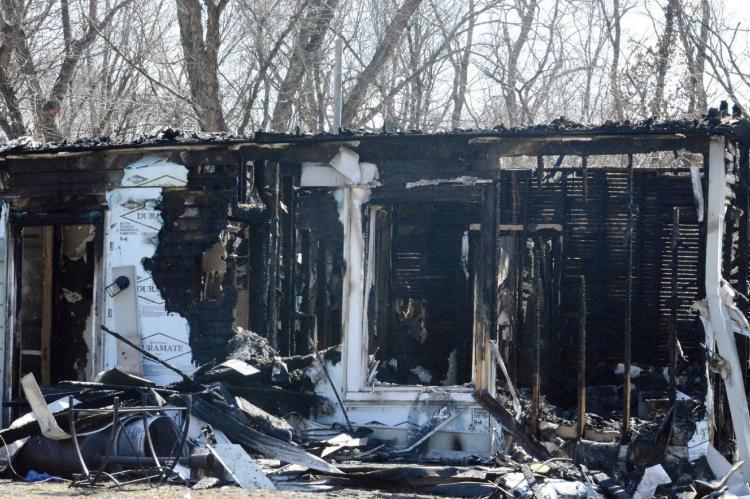 A FIRE Tuesday morning leaves this Richmond home destroyed. SHAWN RONEY | Staff